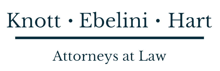 Knott Ebelini Hart logo