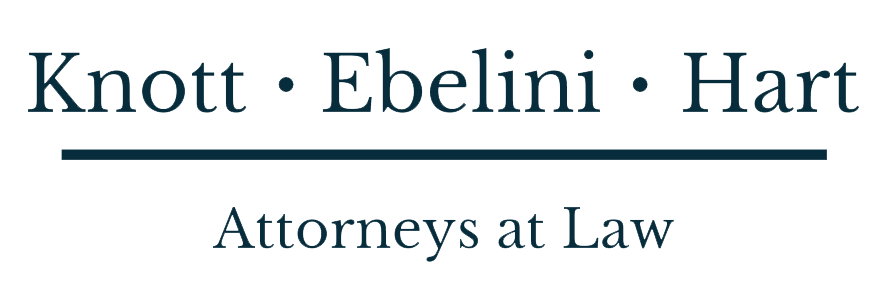 Knott Ebelini Hart logo